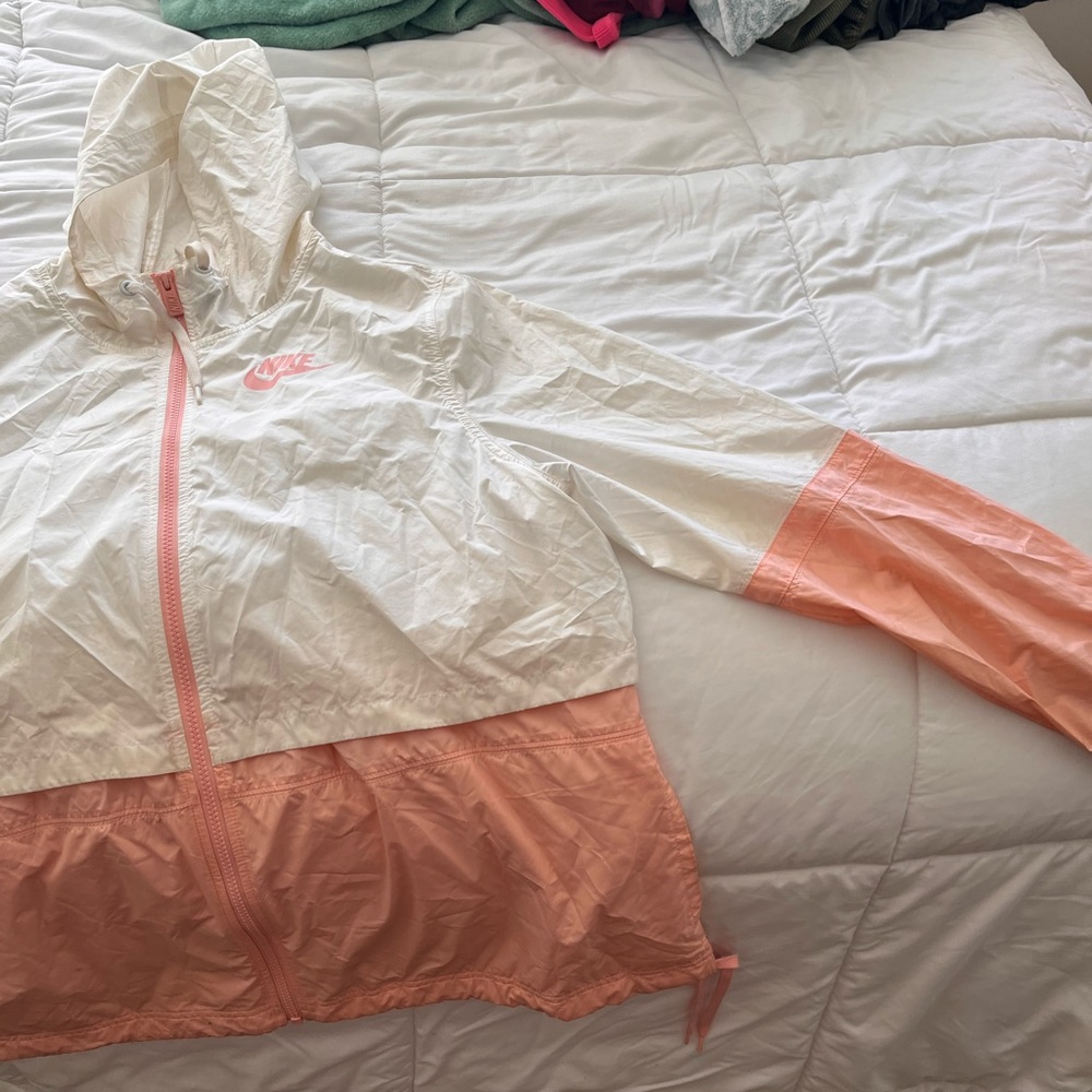 Nike pink and white women’s wind breaker jacket, size large